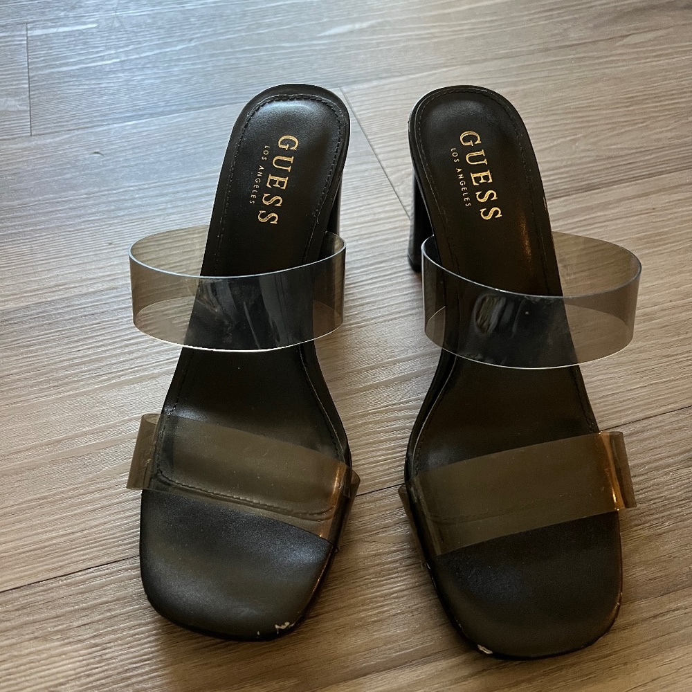 Black, clear strap, size 8 mule heels.